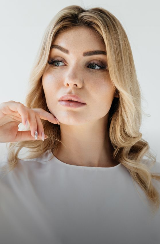 medical spa model in white shirt